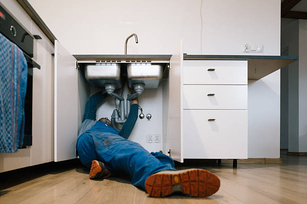 Professional Plumbing technician working in Ridge, NY